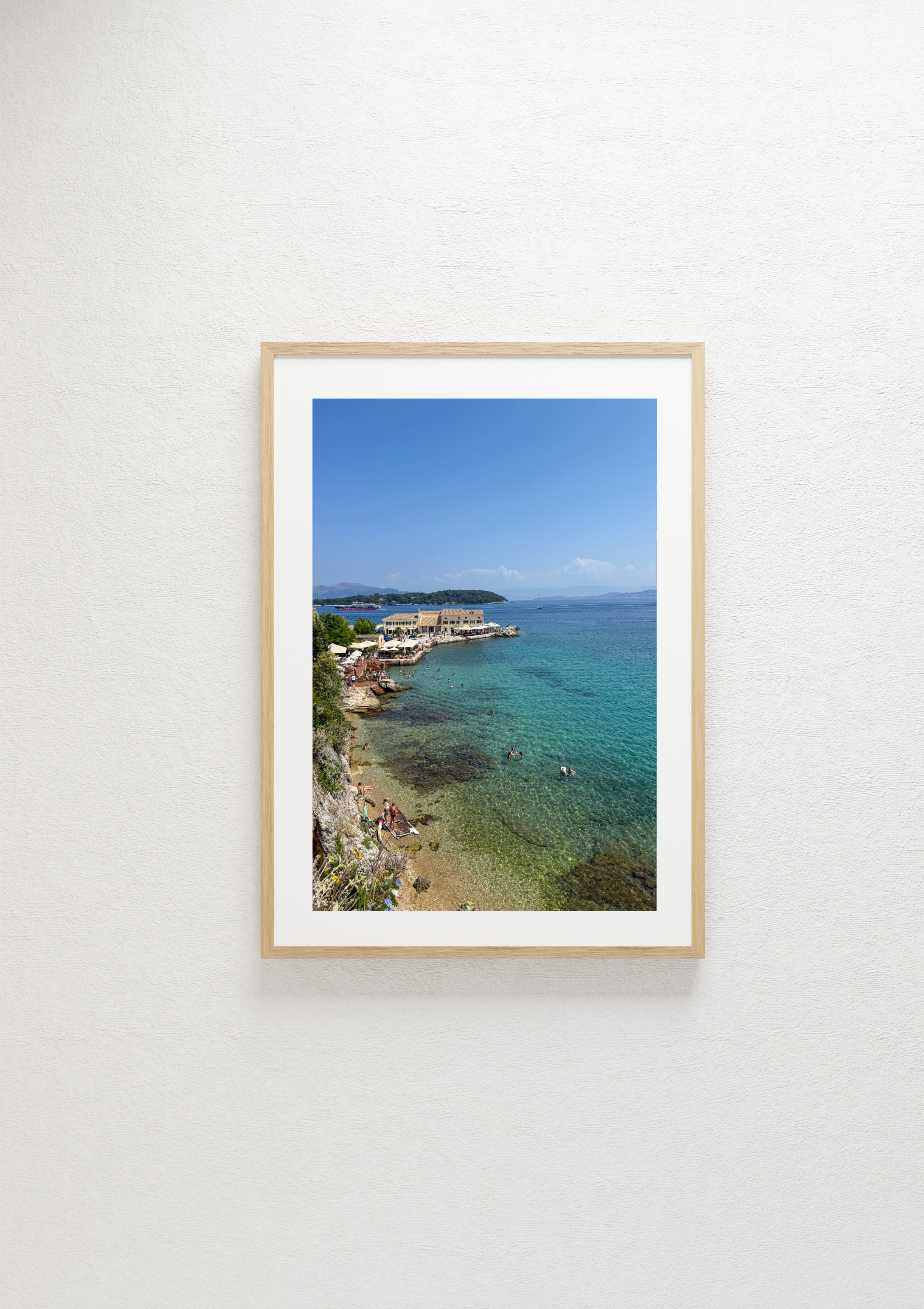 Swimmers in the clear waters of Corfu, Greece – photographic wall art print