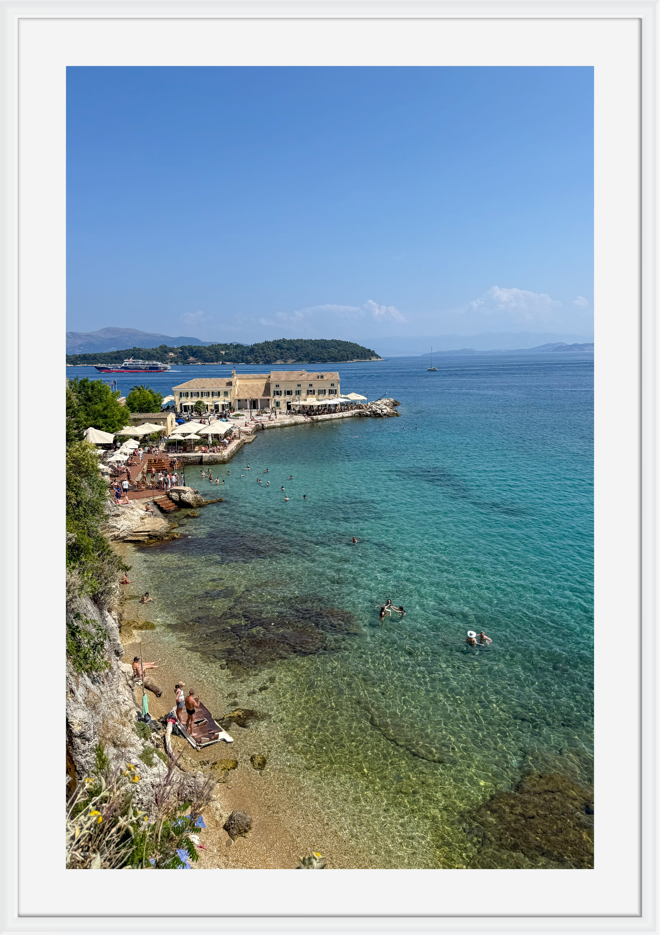 Swimmers in the clear waters of Corfu, Greece – photographic wall art print