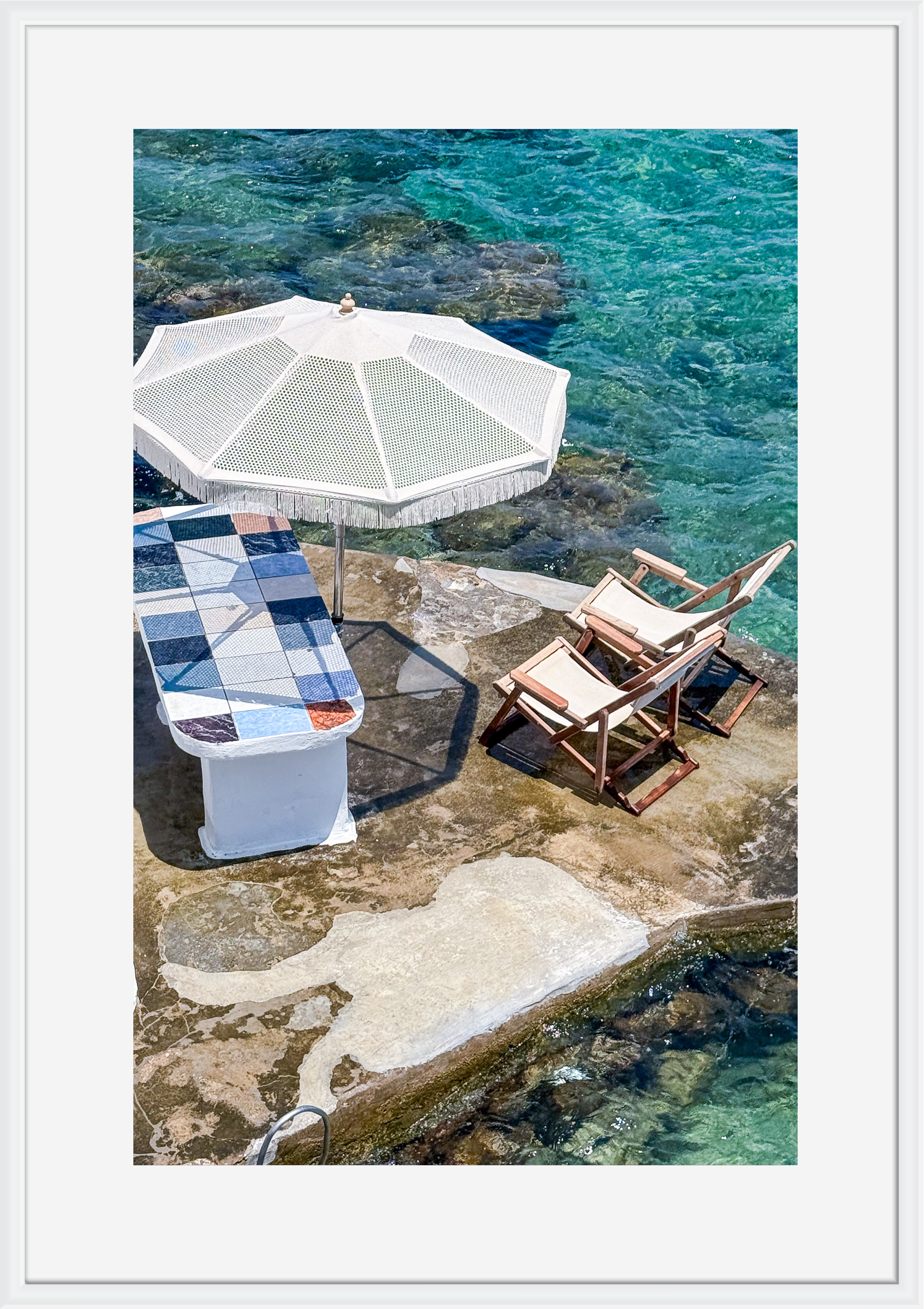 Taverna table at the water's edge in Mandrakia, Milos – photographic wall art print