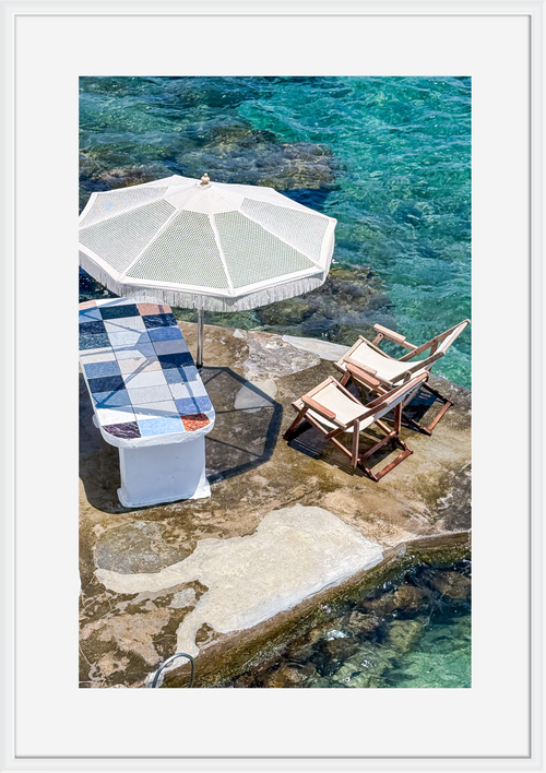 Taverna table at the water's edge in Mandrakia, Milos – photographic wall art print