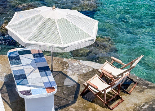 Waterside table in Mandrakia, Milos, Greece – photographic wall art print