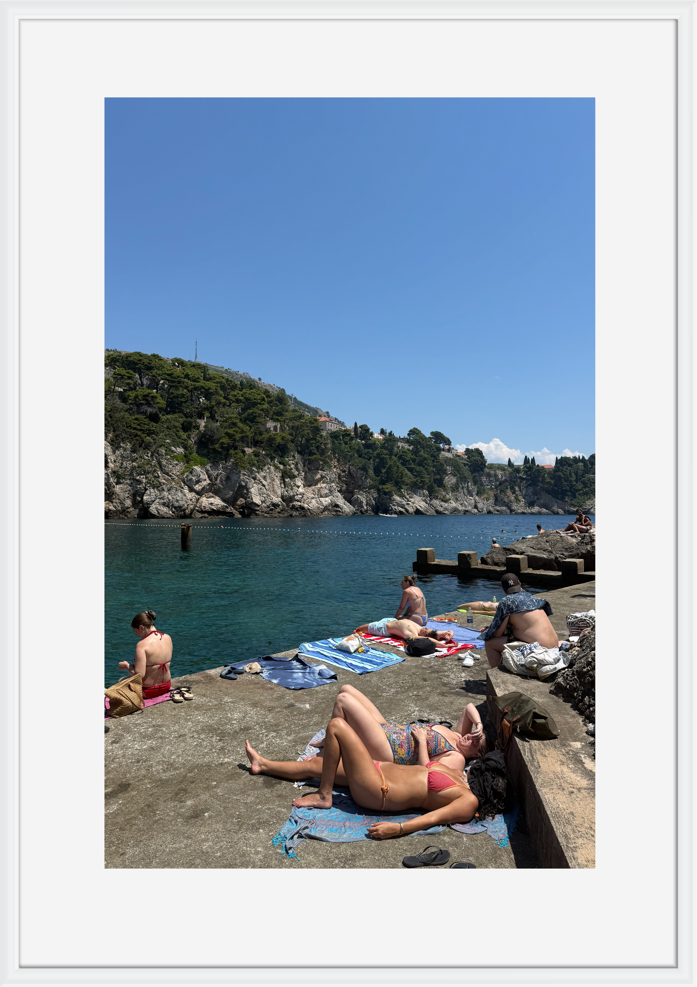 Swimmers below the old city walls of Dubrovnik – photographic wall art print