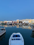 Evening light reflected on still water at Mandrakia, Milos – photographic wall art print